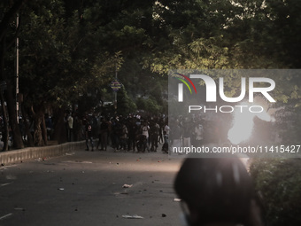 An explosion is being seen as anti-quota protestors are approaching the police in Dhaka, Bangladesh, on July 17, 2025. (