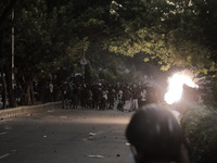 An explosion is being seen as anti-quota protestors are approaching the police in Dhaka, Bangladesh, on July 17, 2025. (