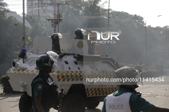 Police are firing tear gas towards anti-quota protestors in Dhaka, Bangladesh, on July 17, 2024. 