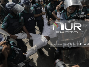 An anti-quota protestor is being arrested by police in Dhaka, Bangladesh, on July 17, 2024. (