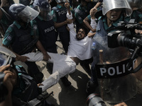 An anti-quota protestor is being arrested by police in Dhaka, Bangladesh, on July 17, 2024. (