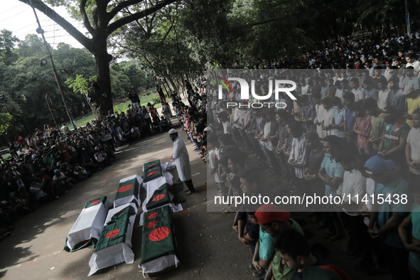 Anti-quota protestors are attending a shadow funeral of their fellow protesters who are dying around the country while protesting in Dhaka,...