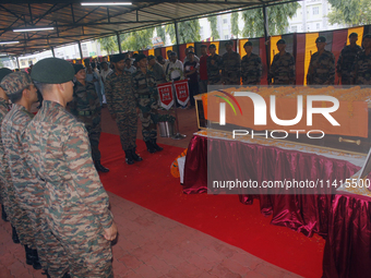 Indian ARMY personnel are paying respect in front of the coffin of martyred Army captain Brijesh Thapa, a resident of Darjeeling who was kil...