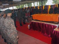 Indian ARMY personnel are paying respect in front of the coffin of martyred Army captain Brijesh Thapa, a resident of Darjeeling who was kil...