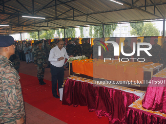 Indian ARMY personnel are paying respect in front of the coffin of martyred Army captain Brijesh Thapa, a resident of Darjeeling who was kil...