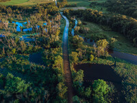 The Sugar River in Albany, WI, is swelling above flood stage after back-to-back derechos are hitting parts of the Midwest, including Wiscons...