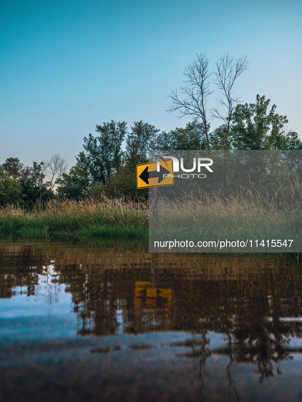 The Sugar River in Albany, WI, is swelling above flood stage after back-to-back derechos are hitting parts of the Midwest, including Wiscons...