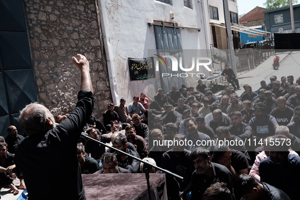 Shiite Muslim mourners are taking part in a religious procession on the tenth day of Ashura in the Islamic month of Muharram in Pireaus, Gre...