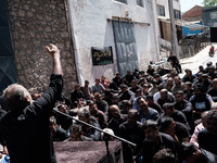 Shiite Muslim mourners are taking part in a religious procession on the tenth day of Ashura in the Islamic month of Muharram in Pireaus, Gre...