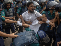 Police are detaining a man who is not leaving the University of Dhaka premises, a day after the clash between Bangladesh Chhatra League, the...