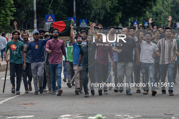 Anti-quota protesters are marching with a dummy coffin at the University of Dhaka, remembering those who are dying yesterday during the clas...