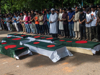 Anti-quota protesters are joining in a funeral prayer with a dummy coffin at the University of Dhaka, remembering those who are dying yester...