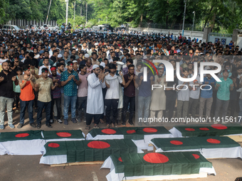 Anti-quota protesters are joining in a funeral prayer with a dummy coffin at the University of Dhaka, remembering those who are dying yester...