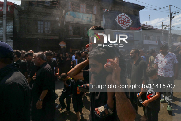 Kashmiri Shia Muslims are participating in the Ashura procession in Srinagar, Indian Administered Kashmir, on July 17, 2024. 