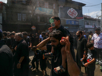 Kashmiri Shia Muslims are participating in the Ashura procession in Srinagar, Indian Administered Kashmir, on July 17, 2024. (