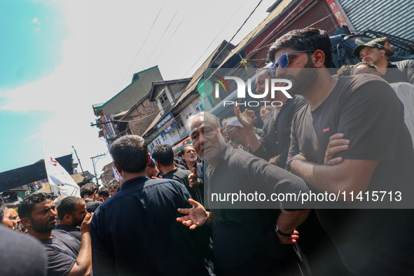 Kashmiri Shia Muslims are participating in the Ashura procession in Srinagar, Indian Administered Kashmir, on July 17, 2024. 