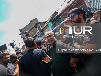 Kashmiri Shia Muslims are participating in the Ashura procession in Srinagar, Indian Administered Kashmir, on July 17, 2024. (