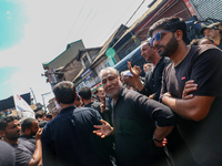 Kashmiri Shia Muslims are participating in the Ashura procession in Srinagar, Indian Administered Kashmir, on July 17, 2024. (