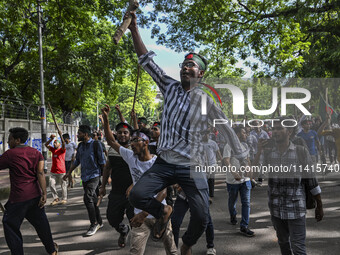 Students are shouting slogans during a protest against quotas in government jobs at the Dhaka University area, in Dhaka, Bangladesh, on July...