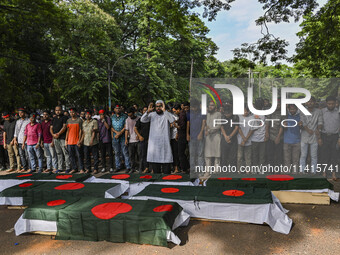 Anti-quota protester students are joining in funeral prayers with dummy coffins at the University of Dhaka campus, a day after the clash bet...