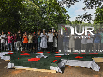 Anti-quota protester students are joining in funeral prayers with dummy coffins at the University of Dhaka campus, a day after the clash bet...