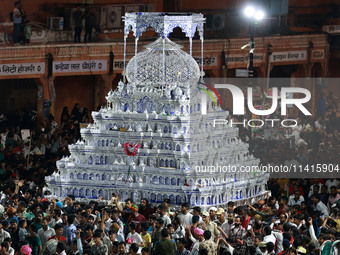 Indian Muslims are carrying 'Tazias' as they are taking part in a Muharram procession in Jaipur, Rajasthan, India, on July 17, 2024. During...