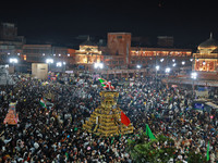 Indian Muslims are carrying 'Tazias' as they are taking part in a Muharram procession in Jaipur, Rajasthan, India, on July 17, 2024. During...