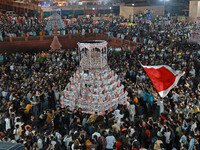 Indian Muslims are carrying 'Tazias' as they are taking part in a Muharram procession in Jaipur, Rajasthan, India, on July 17, 2024. During...