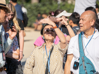 People are spending the afternoon in the city center at the gates of the first heat wave on the Iberian Peninsula, in Barcelona, Spain, on J...