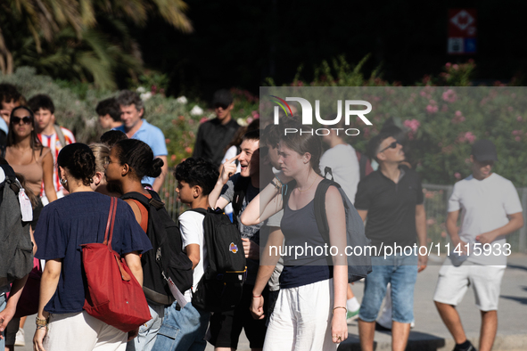 People are spending the afternoon in the city center at the gates of the first heat wave on the Iberian Peninsula, in Barcelona, Spain, on J...