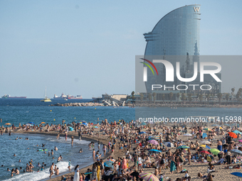 People are spending the afternoon in the city center at the gates of the first heat wave on the Iberian Peninsula, in Barcelona, Spain, on J...