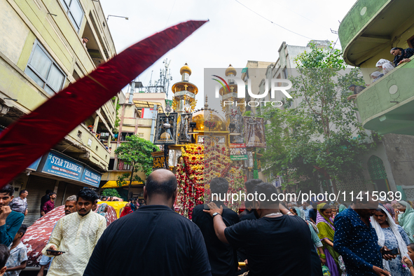 Thousands are gathering on the city's streets as Shia Muslims are observing Yavme Ashura. They are participating in a tazia procession to mo...