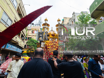 Thousands are gathering on the city's streets as Shia Muslims are observing Yavme Ashura. They are participating in a tazia procession to mo...