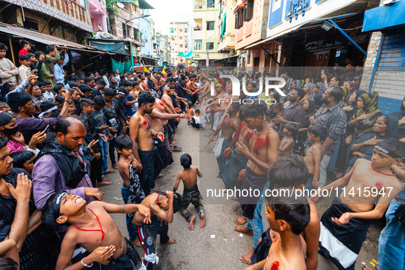 Thousands are gathering on the city's streets as Shia Muslims are observing Yavme Ashura. They are participating in a tazia procession to mo...