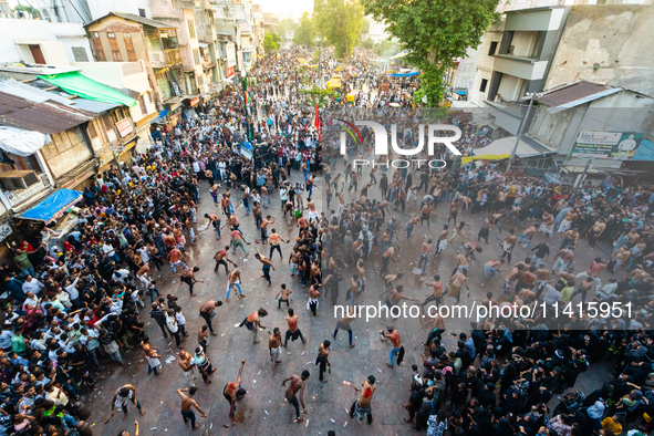 Thousands are gathering on the city's streets as Shia Muslims are observing Yavme Ashura. They are participating in a tazia procession to mo...