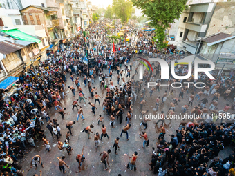 Thousands are gathering on the city's streets as Shia Muslims are observing Yavme Ashura. They are participating in a tazia procession to mo...