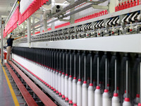 A worker is working on a textile production line in Fuzhou, China, on July 17, 2024. (