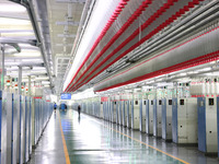 Spinning equipment is working automatically at a 5G smart factory in Fuzhou, China, on July 17, 2024. (