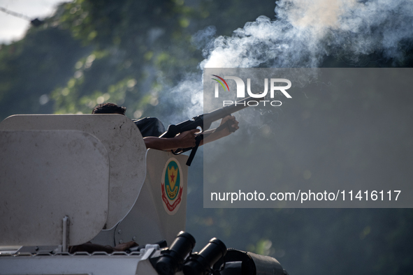 Police are firing teargas during a coffin rally of anti-quota protesters at the University of Dhaka, a day after the clash with Bangladesh C...