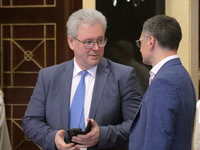 Ukrainian diplomat Yevhen Tsymbaliuk (L) and Minister of Foreign Affairs of Ukraine Dmytro Kuleba are attending the meeting of the Council f...