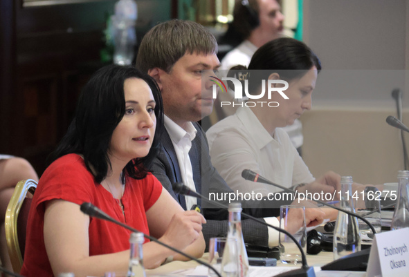 Minister of Social Policy Oksana Zholnovych, Acting Minister of Communities, Territories and Infrastructure Development of Ukraine Vasyl Shk...