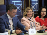 Minister of Foreign Affairs of Ukraine Dmytro Kuleba, First Lady Olena Zelenska, and Minister of Social Policy Oksana Zholnovych (L to R) ar...