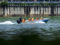 Armed police are training for flood control and rescue in Baise, China, on July 12, 2024. (