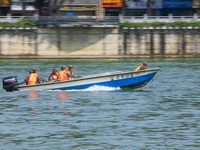 Armed police are training for flood control and rescue in Baise, China, on July 12, 2024. (