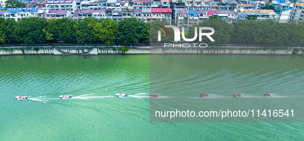 Armed police are training for flood control and rescue in Baise, China, on July 12, 2024. 