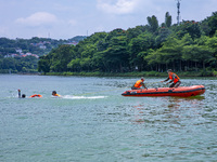 Armed police are training for flood control and rescue in Baise, China, on July 12, 2024. (