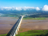 A photo is showing the sunny scenery of the Sanmenxia section of the Yellow River in Sanmenxia, China, on July 18, 2024. (