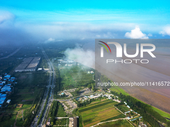 A photo is showing the sunny scenery of the Sanmenxia section of the Yellow River in Sanmenxia, China, on July 18, 2024. (