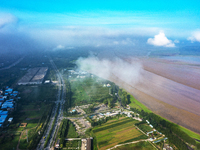 A photo is showing the sunny scenery of the Sanmenxia section of the Yellow River in Sanmenxia, China, on July 18, 2024. (