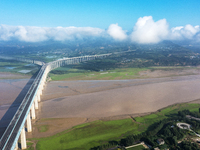 A photo is showing the sunny scenery of the Sanmenxia section of the Yellow River in Sanmenxia, China, on July 18, 2024. (